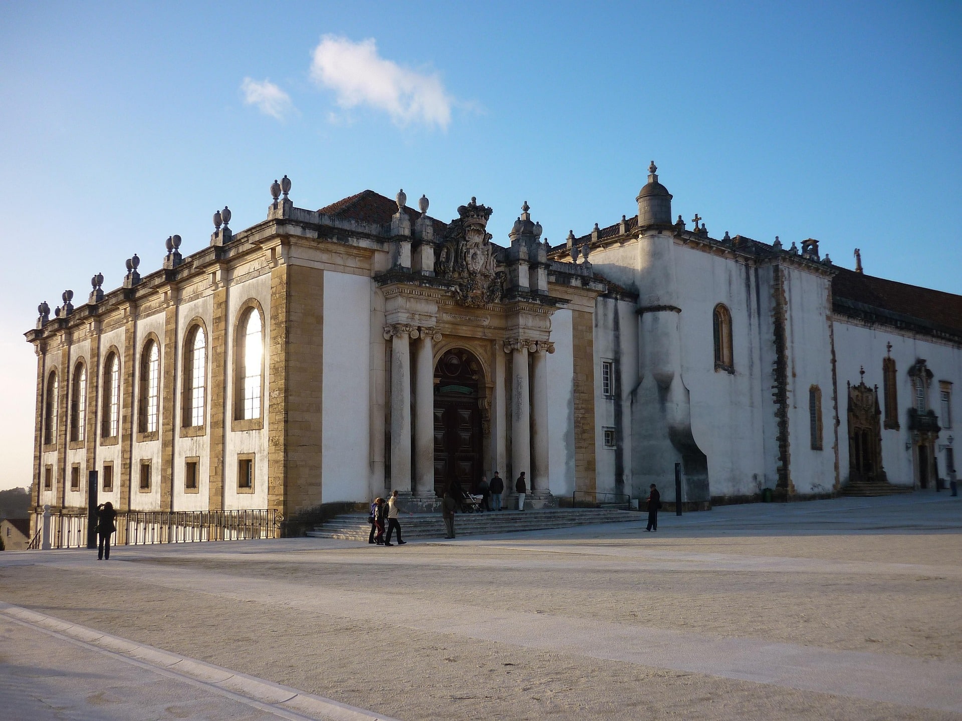 Exterior view of the Joanina Library in Coimbra, Portugal, showcasing its historic architecture and significance as a must-see attraction.