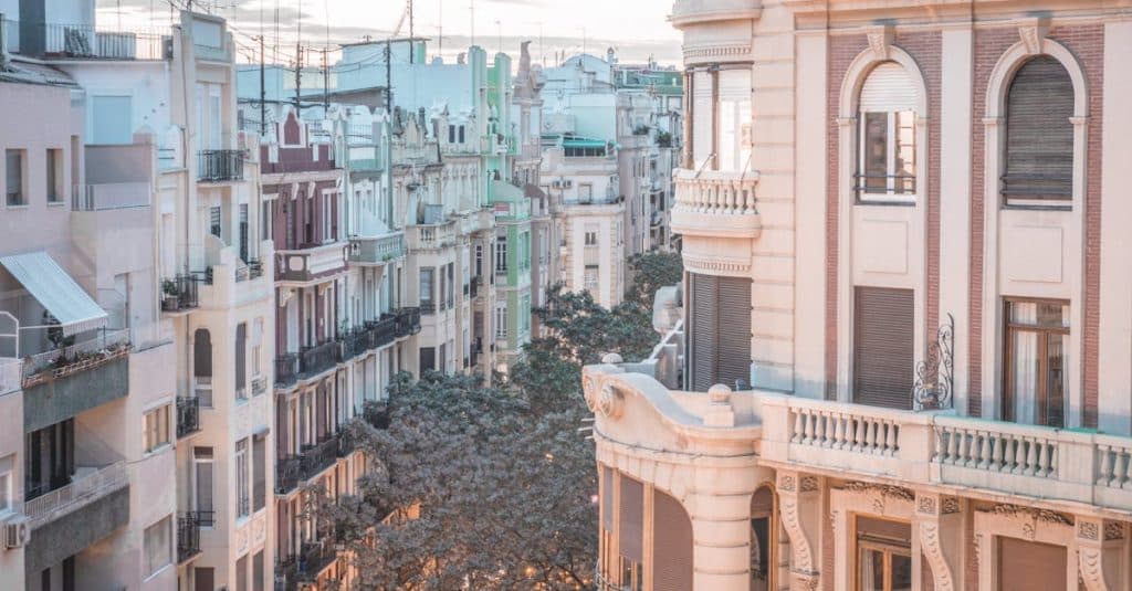 Traditional buildings in Valencia, Spain, reflecting the urban housing market for renters.