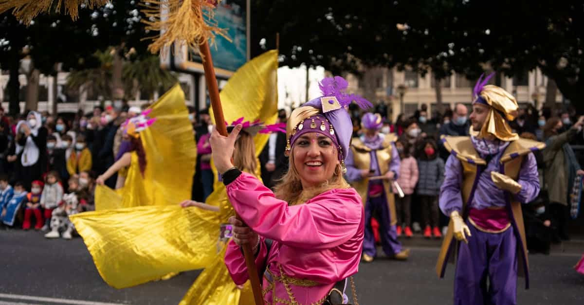Colorful parade participants in festive costumes celebrating a local festival in A Coruña, Spain, showcasing the magic of Spanish traditions.