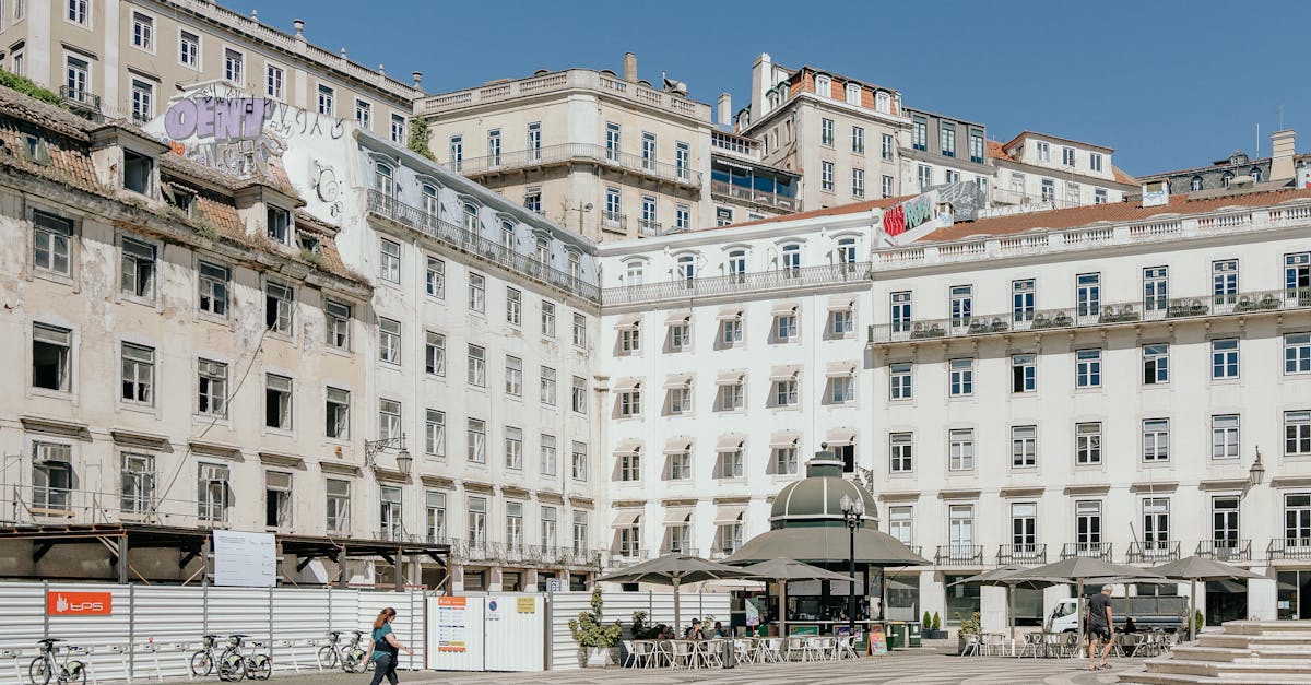 A vibrant cityscape featuring local landmarks and a bustling sidewalk café in Lisbon, Portugal, capturing the essence of the city’s culture and daily life.