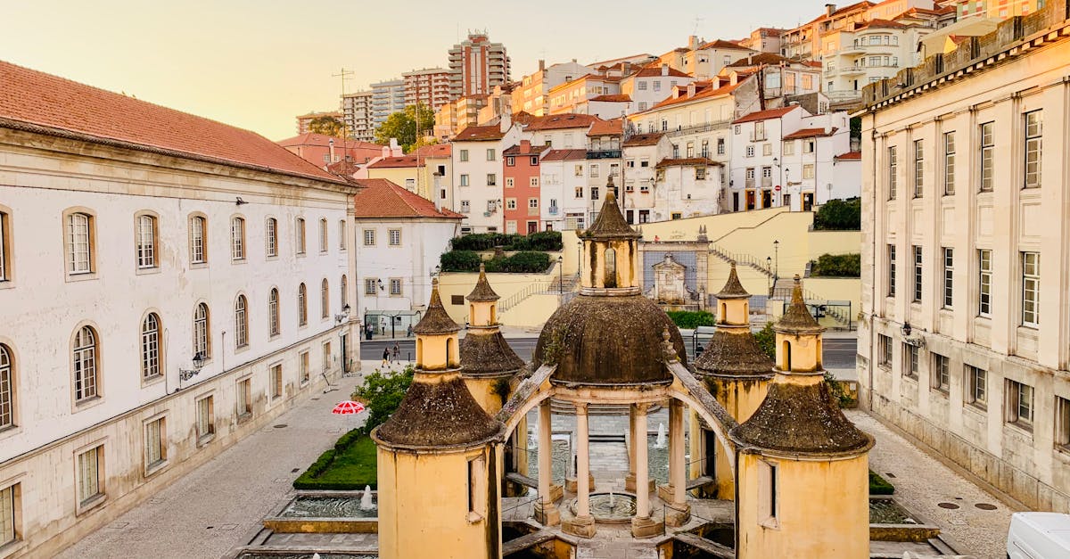 A stunning view of Jardim da Manga in Coimbra, Portugal, showcasing Renaissance architecture at sunset and reflecting the city’s rich cultural heritage.