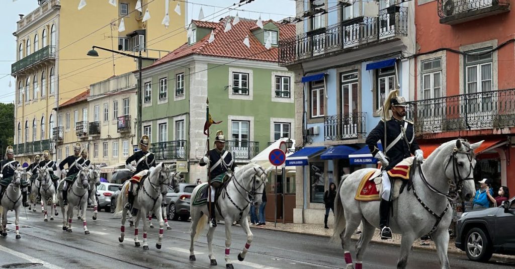 Military parade featuring cavalry in Lisbon's vibrant streets, showcasing Portugal’s cultural heritage and national holiday celebrations.