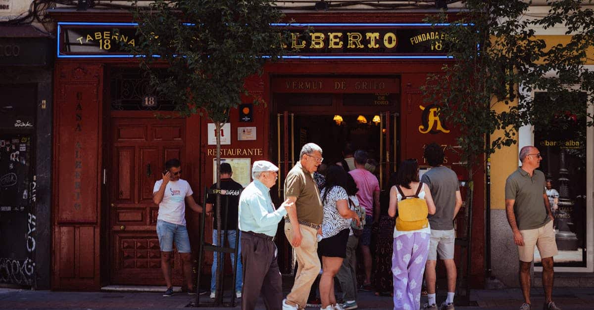 People gathering outside Taberna Alberto in Madrid, capturing the lively street life and authentic local dining experience.