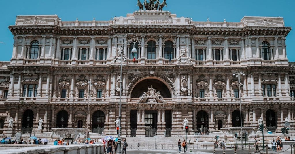 Rome's iconic Palace of Justice on a sunny day, symbolizing Italy’s legal system and the legal rights and obligations for expats.