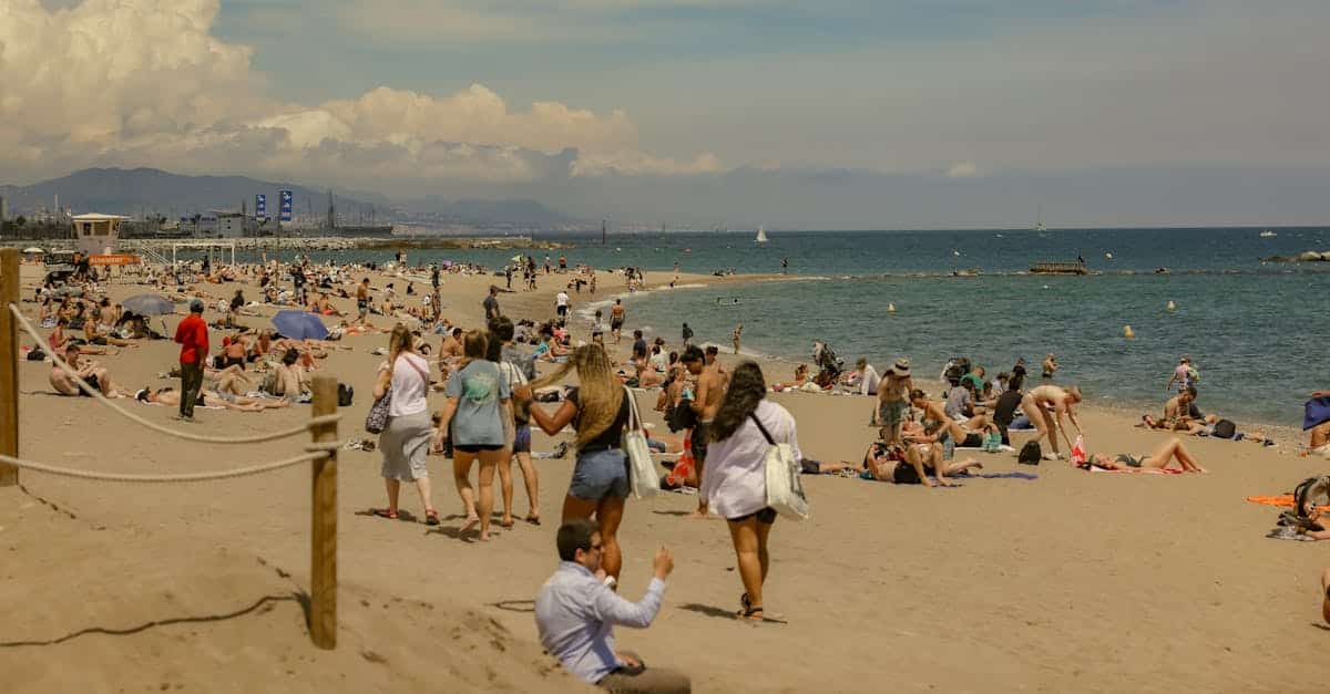 A lifeguard watching over a busy Barcelona beach, ensuring swimmer safety and emergency preparedness.