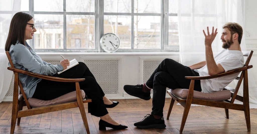An expat speaking with a counselor in Spain, accessing mental health resources to support their well-being.
