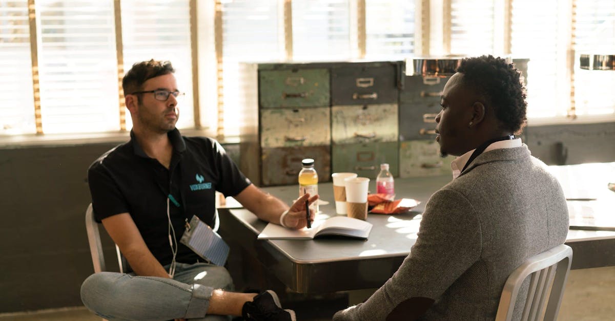 A person speaking with a therapist in a cozy office, representing mental health support and resources for expats in Berlin.